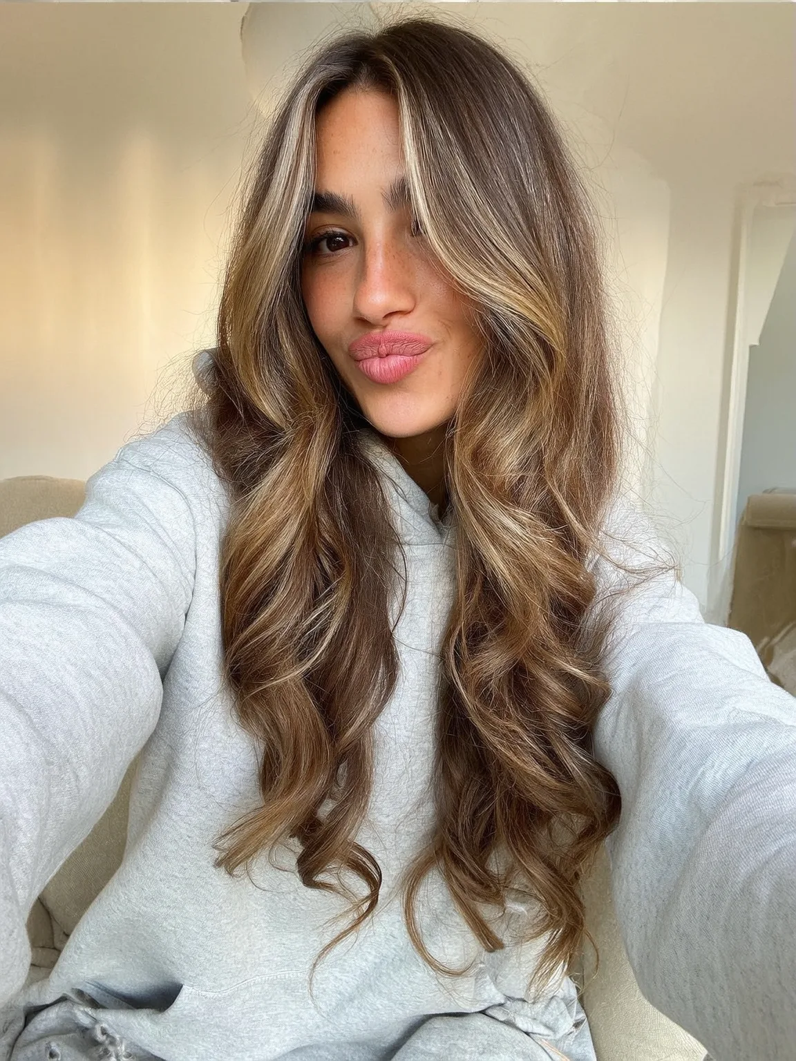 Voluminous Warm Caramel Brown Waves with Honey Blonde Highlights